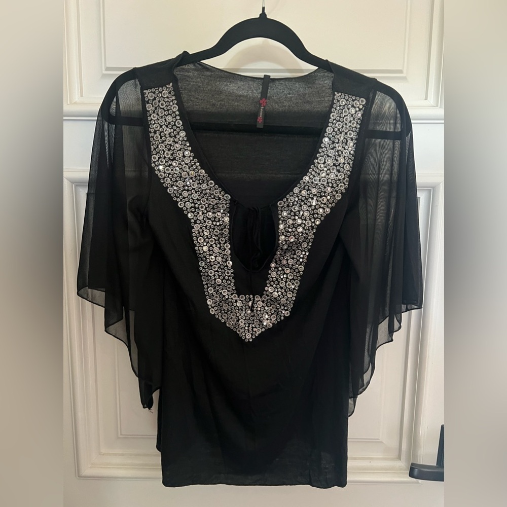 Lightweight, classy top with sheer arms, sparkly silvery detail